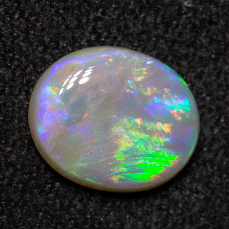 0.76 ct white opal 7.5x6.2x2.3mm
