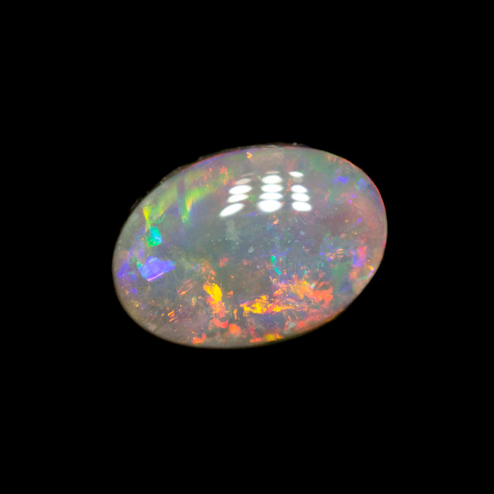 0.76 ct dark opal 7.1x5.1x3mm