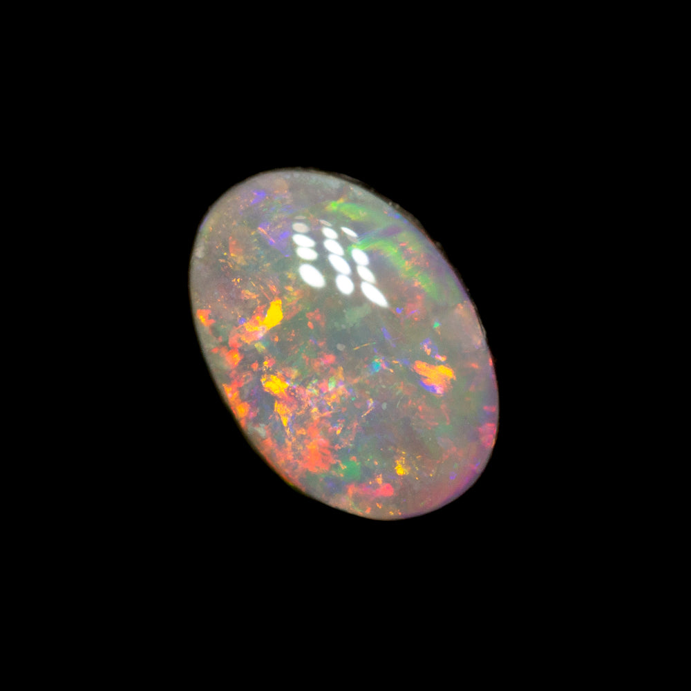 0.76 ct dark opal 7.1x5.1x3mm