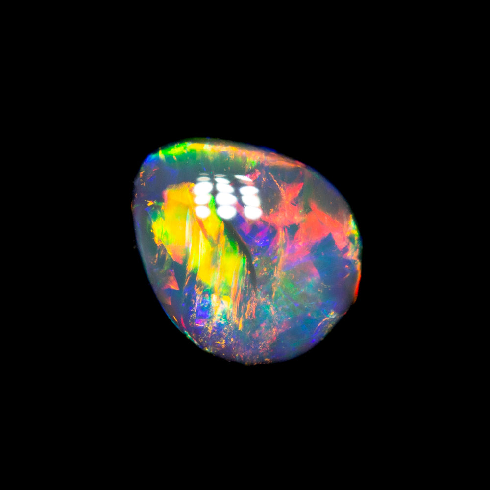 0.77 ct gem black opal 6.7x5.6x3.2mm