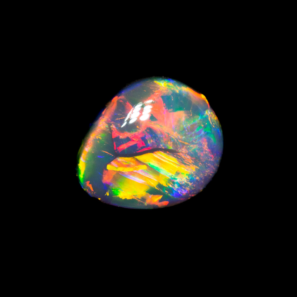 0.77 ct gem black opal 6.7x5.6x3.2mm