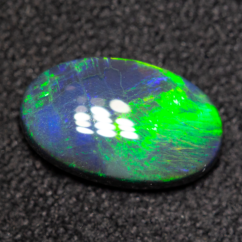 0.78 ct black opal 9.1x5.6x2.4mm