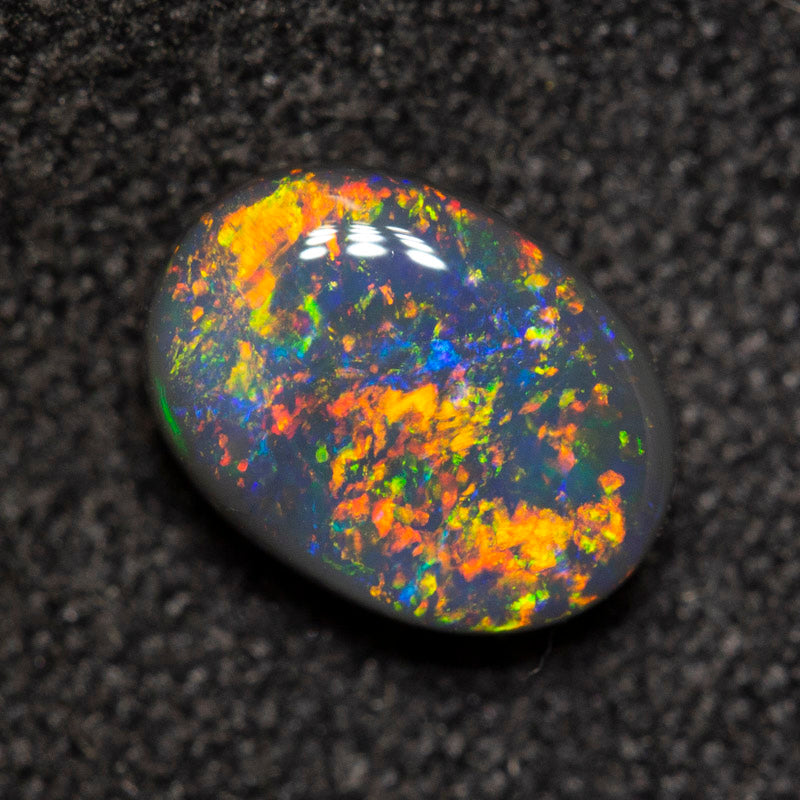 0.78 ct black opal 7.1x5.2x3mm