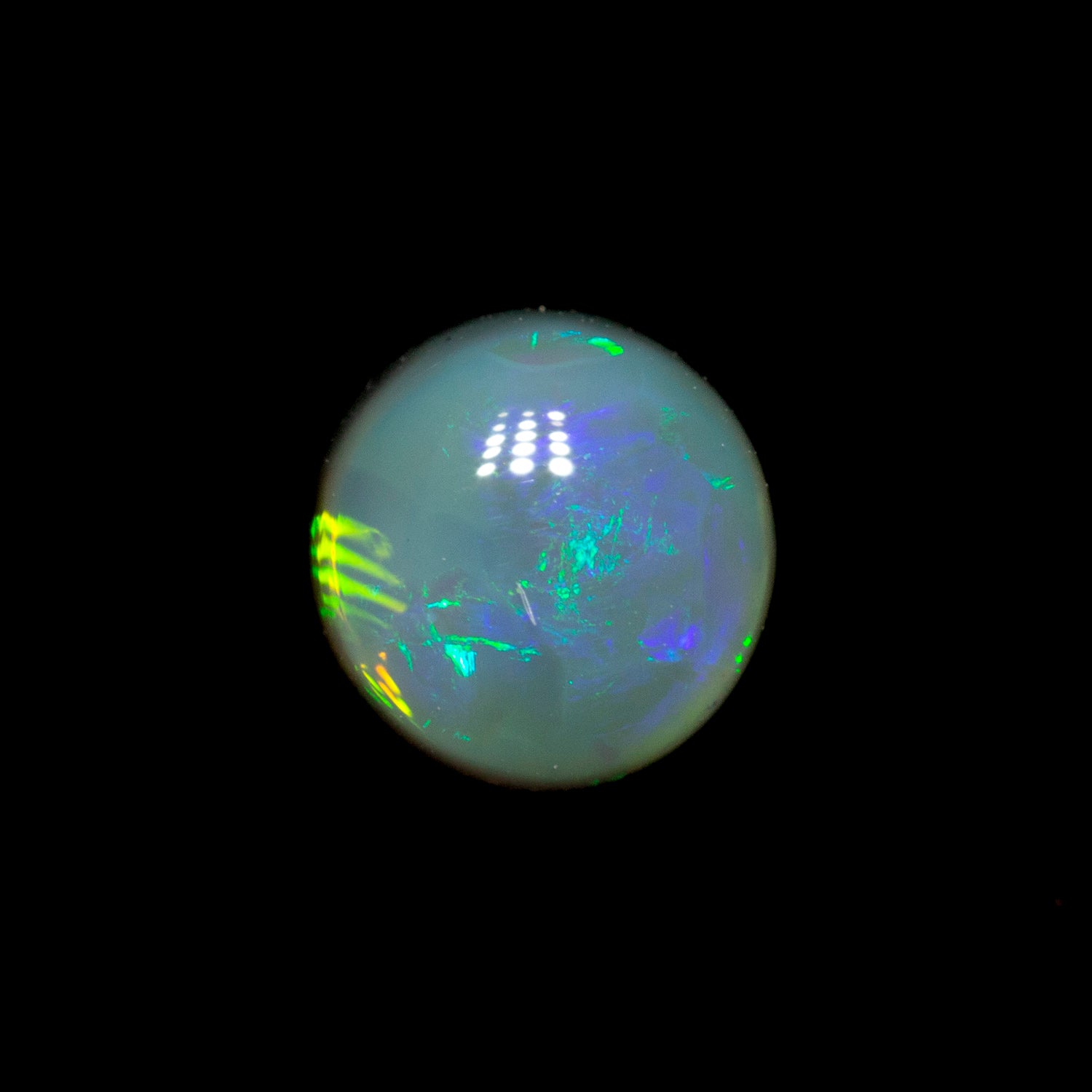 0.78 ct black opal 5.8x5.7x3.5mm