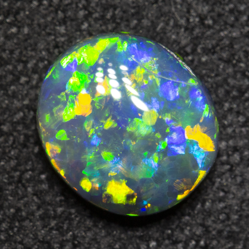0.78 ct black opal 7x6.3x2.7mm