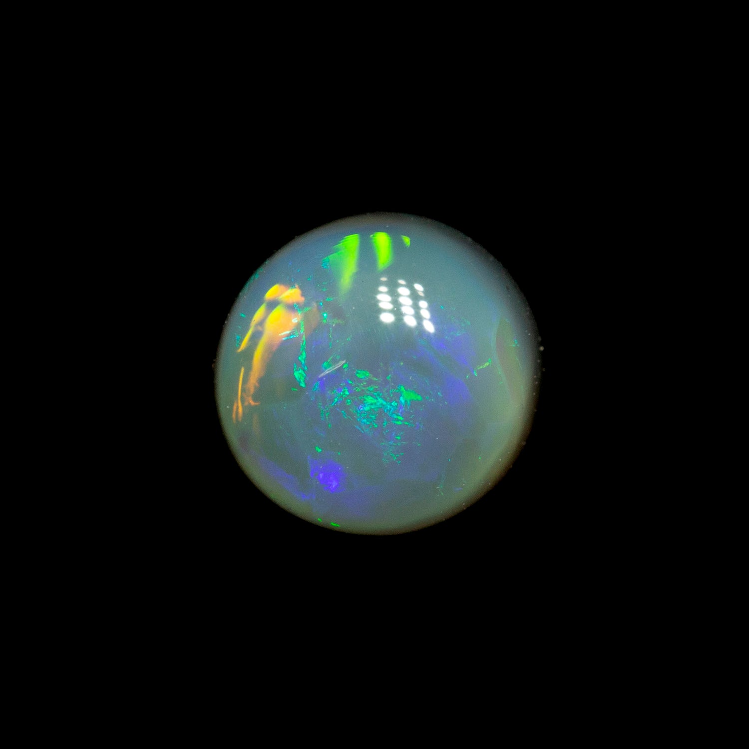 0.78 ct black opal 5.8x5.7x3.5mm