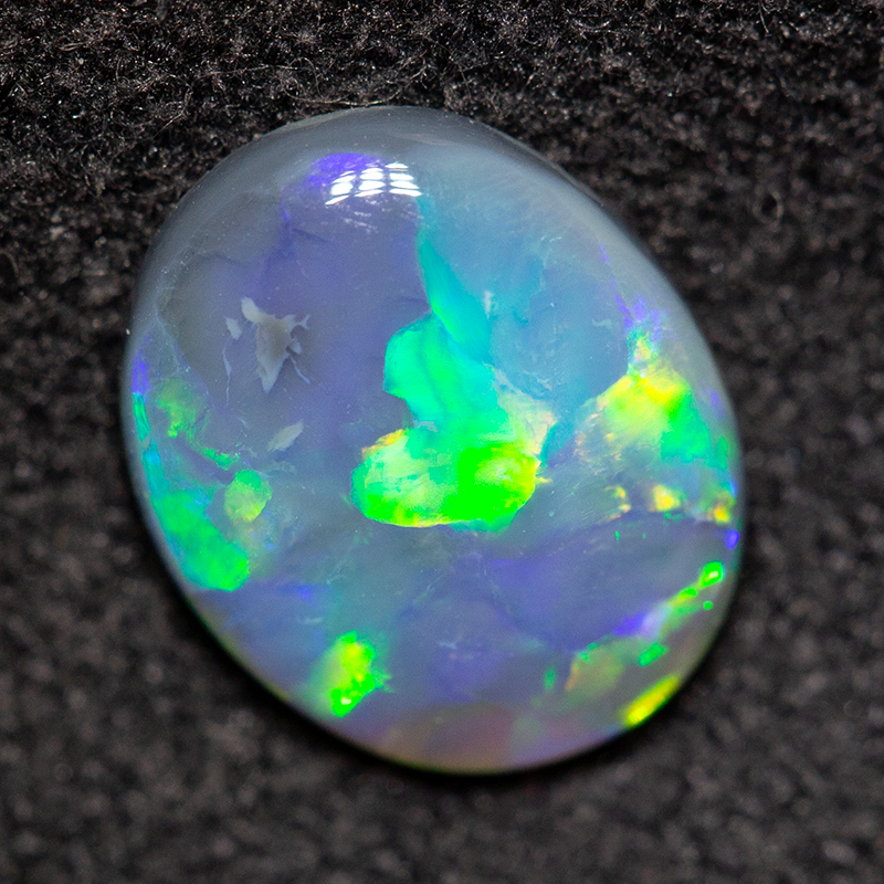 0.79 ct black opal 8x7x2mm