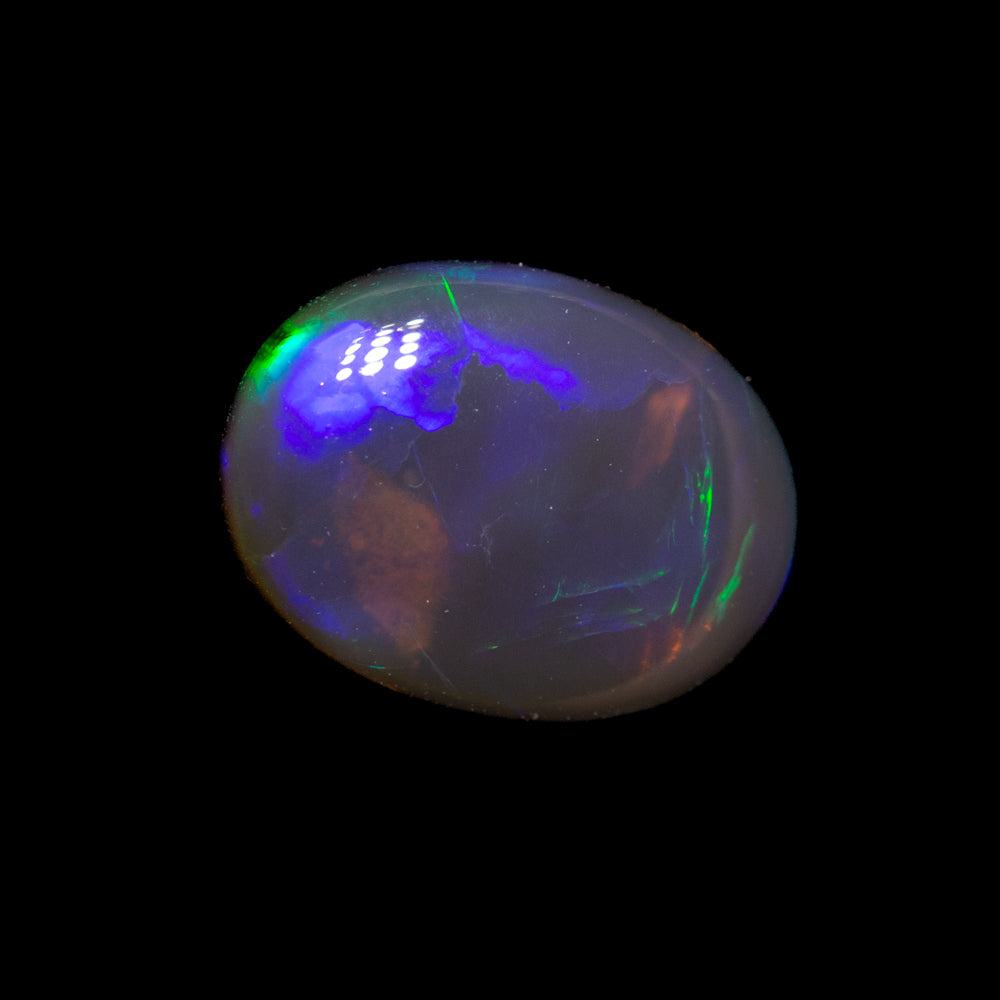 0.79 ct black crystal opal 7.8x5.9x2.6mm