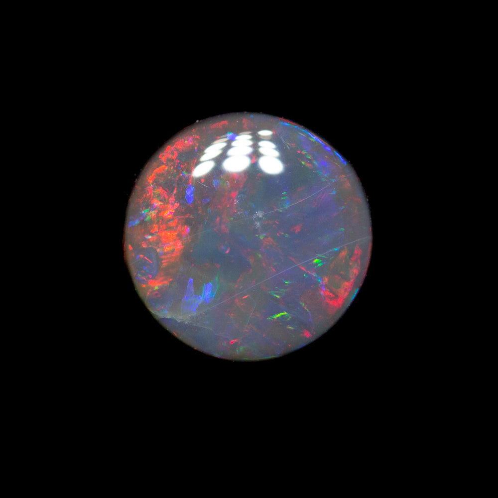 0.79 ct black opal 6.6x6.5x2.7mm