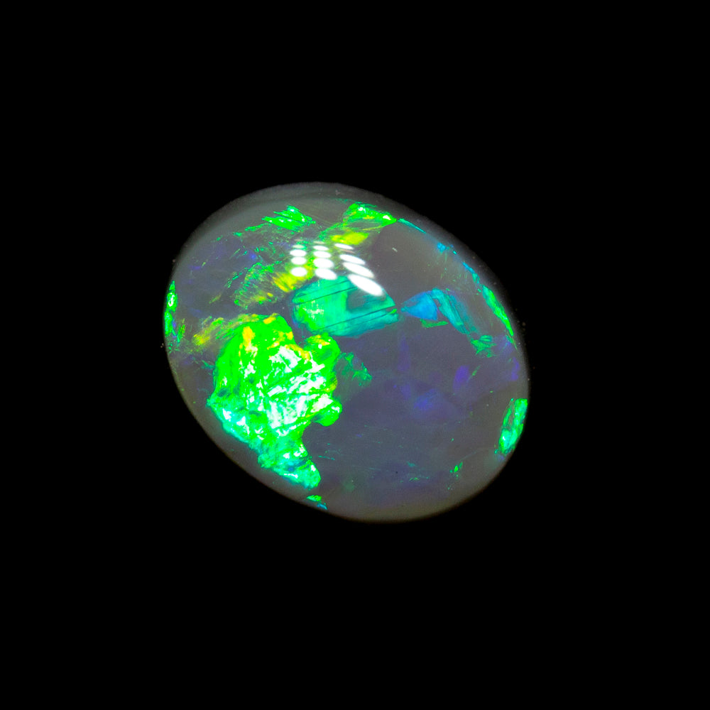 0.79 ct black opal 7.1x5.6x2.9mm