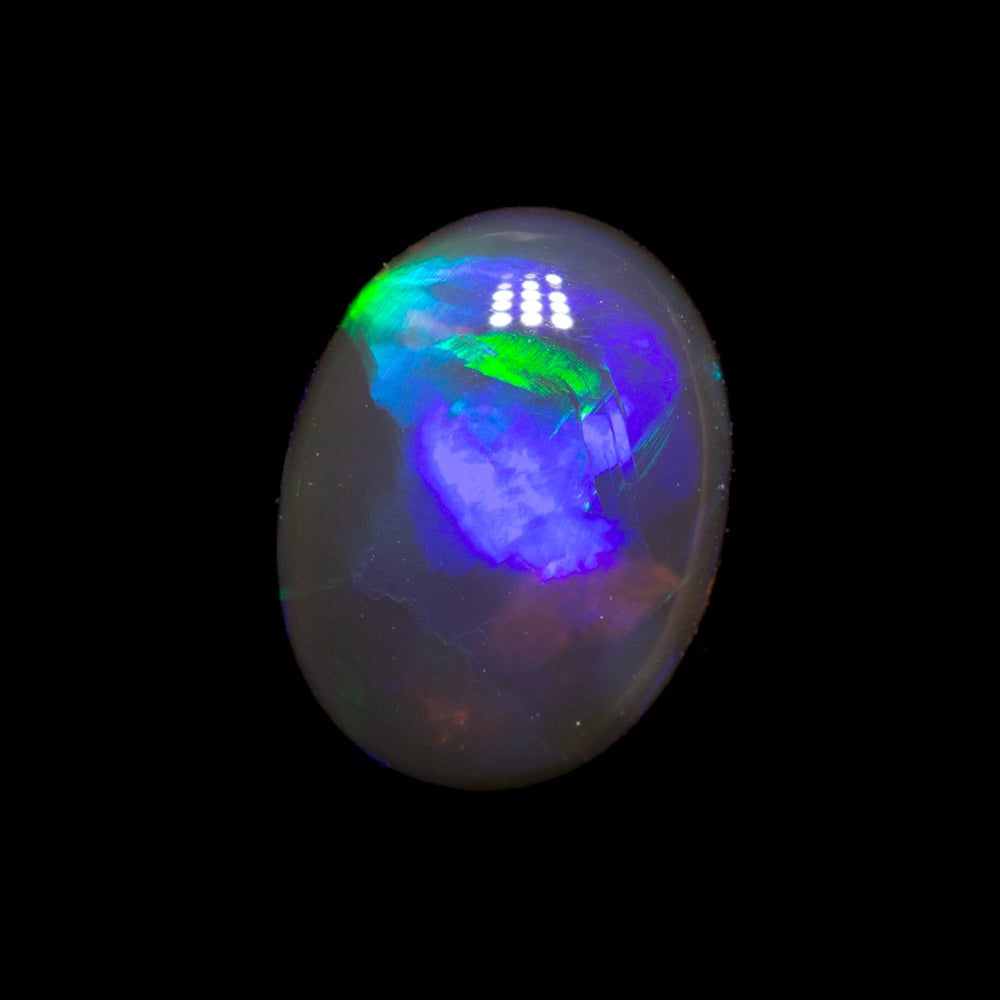 0.79 ct black crystal opal 7.8x5.9x2.6mm