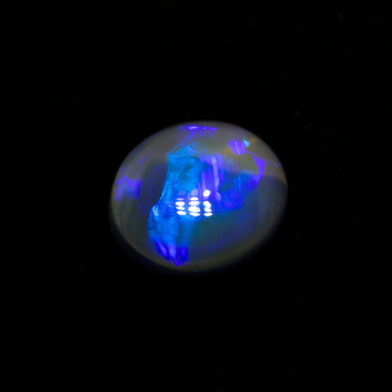 0.80 ct black opal 6.4x5.6x3.9mm