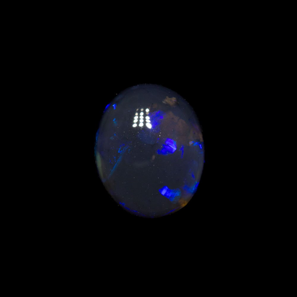 0.80 ct black opal 7x5.8x3.2mm
