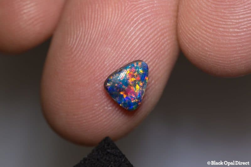 0.80 ct black opal triangle gem 7x6x2.8mm