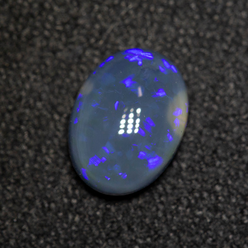 0.81 ct black opal 7.6x5.6x3.1mm