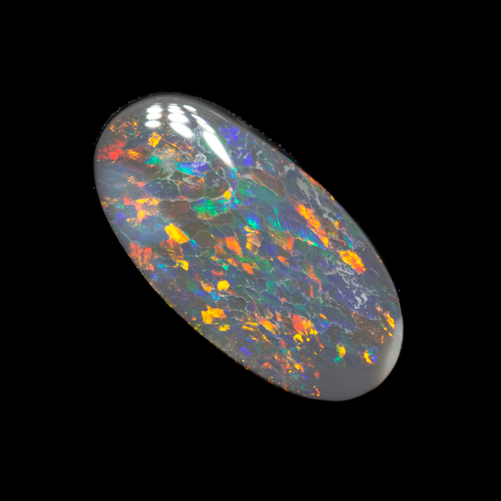 0.81 ct black opal 10.3x5.3x2.1mm
