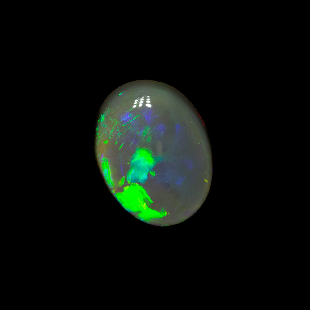 0.81 ct dark crystal opal 7.3x5.7x2.8mm