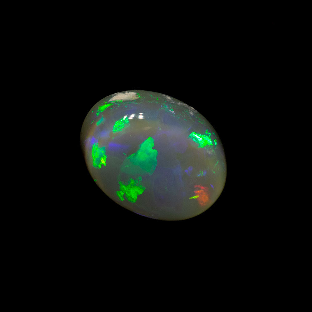 0.81 ct dark crystal opal 7.3x5.7x2.8mm