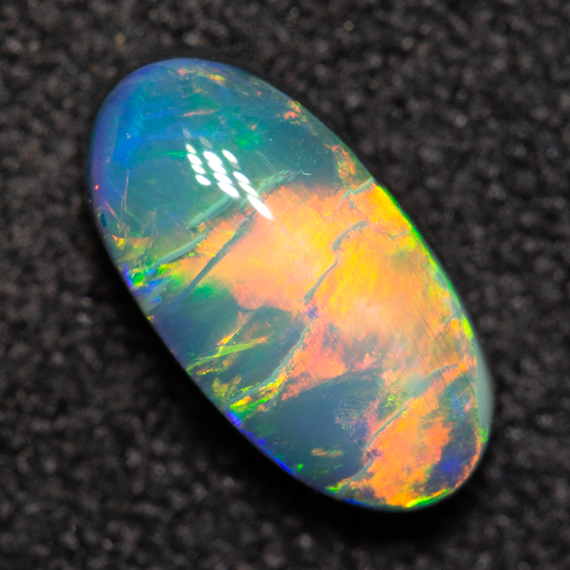 0.81 ct black opal 8.5x4.4x3mm
