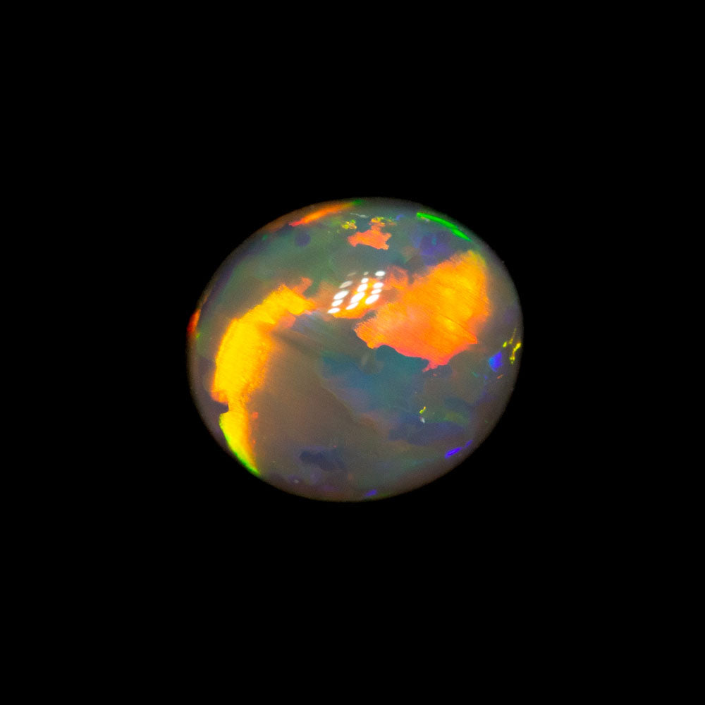 0.81 ct dark opal 8x5.9x2.9mm