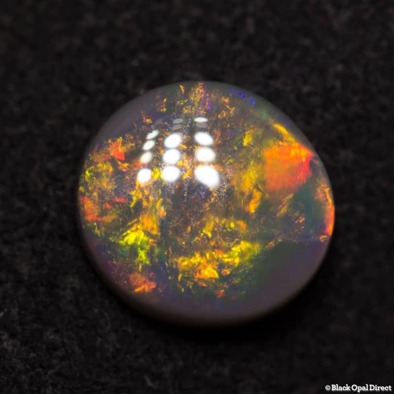 0.81 ct black opal 6.5x6x2.5mm