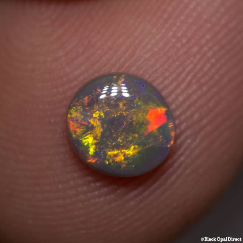 0.81 ct black opal 6.5x6x2.5mm