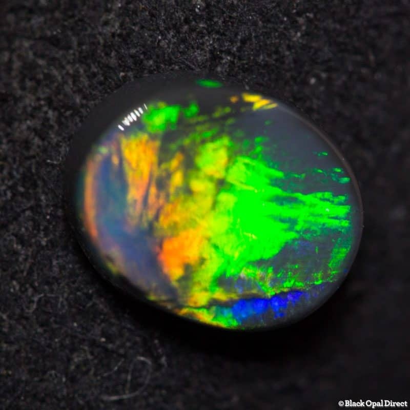 0.82 ct black opal 7x5.5x2mm