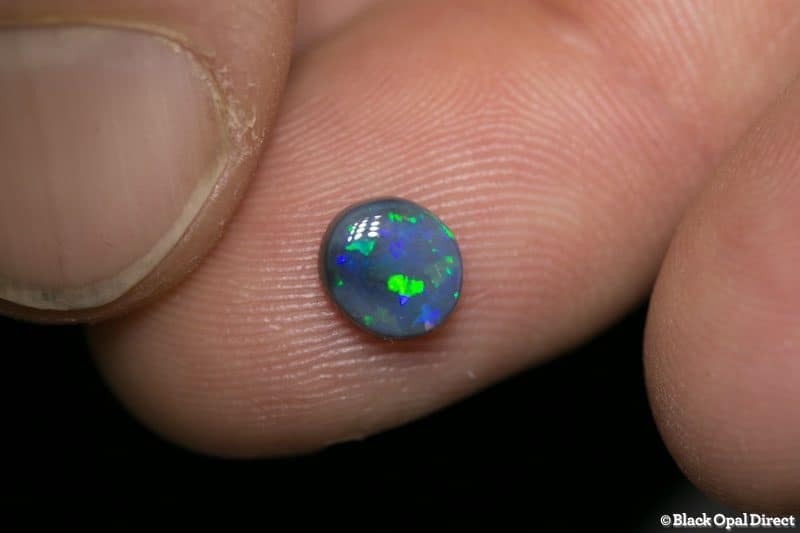 0.82 ct black opal 7x6x2.5mm