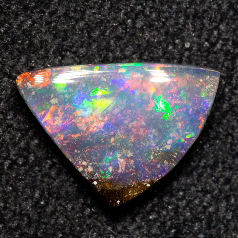 0.83 ct boulder opal 8.3x5.6x2.4mm