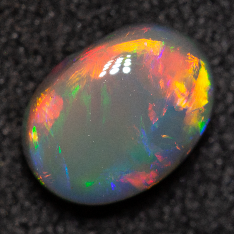 0.83 ct black opal 7.3x5.3x3.3mm