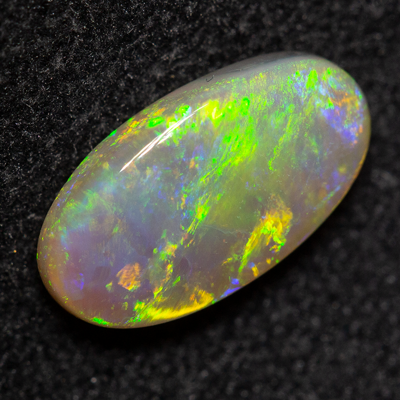 0.83 ct dark opal 9x5x2mm