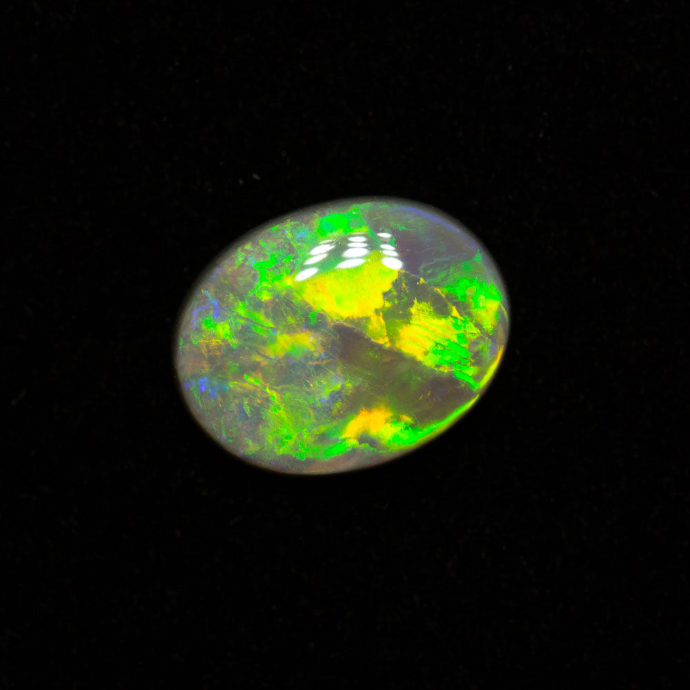 0.83 ct dark opal 8.2x6.4x2.3mm