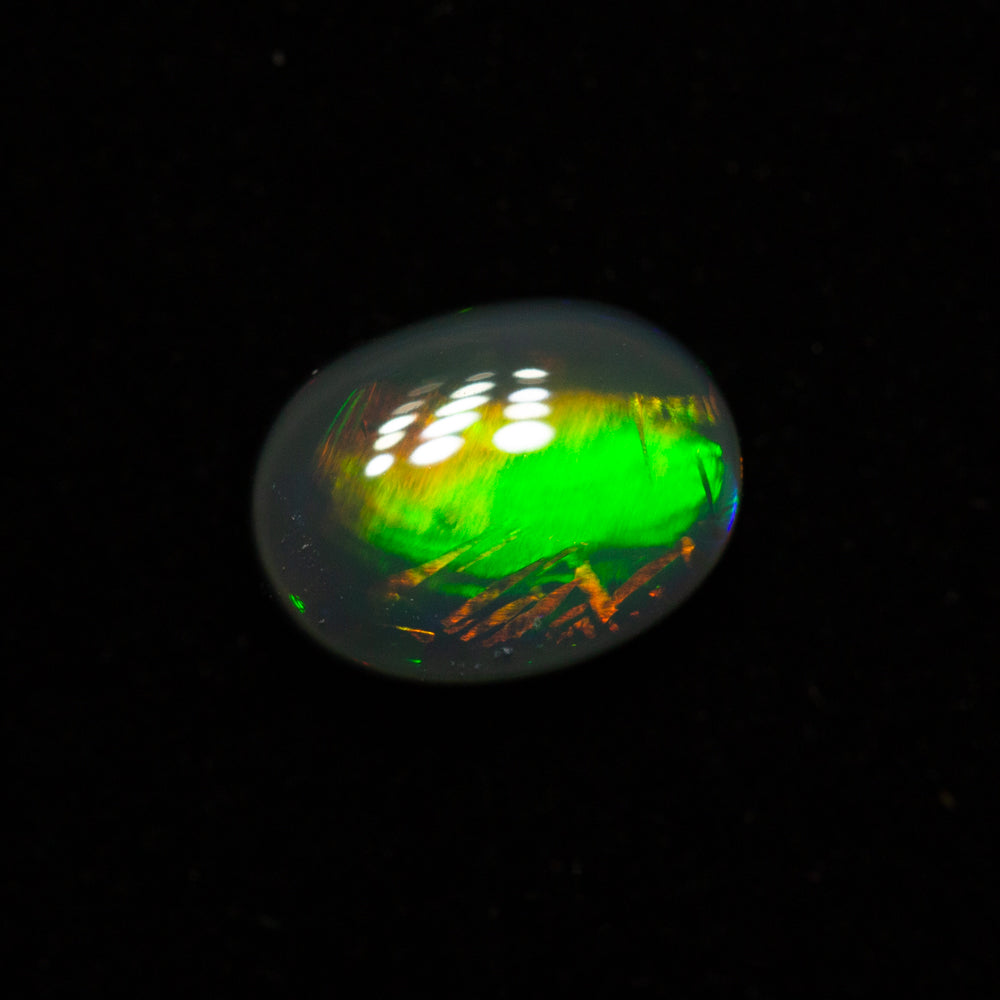 0.84 ct black opal 7.3x5.5x3.2mm