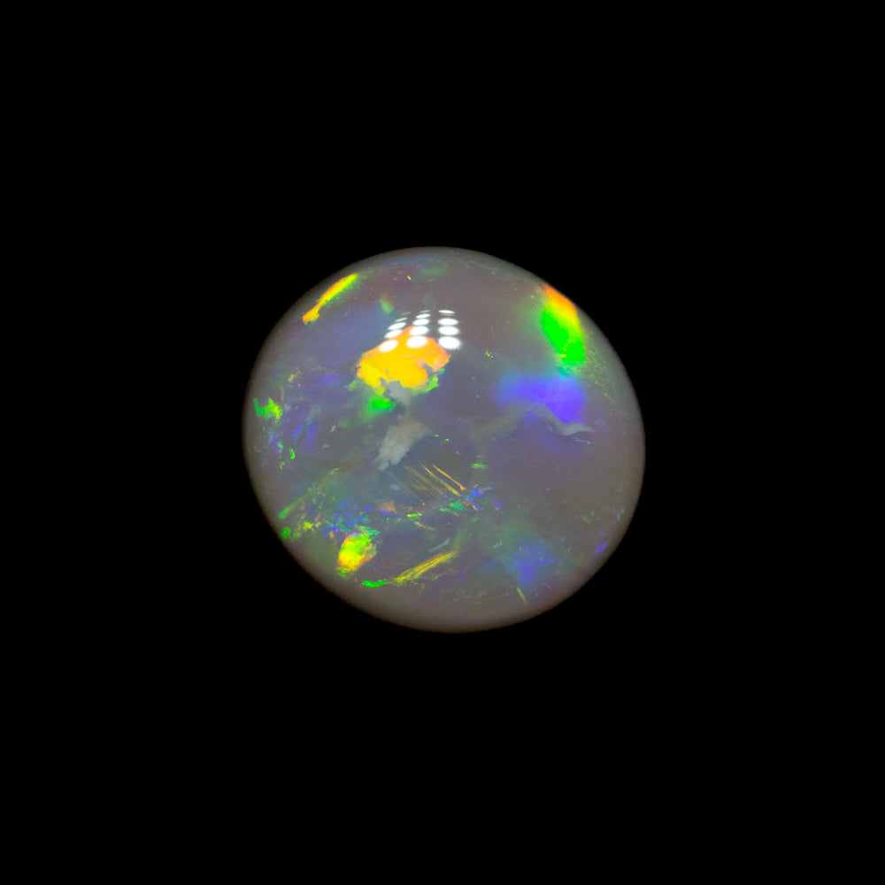 0.84 ct dark opal 7.3x6.8x2.7mm