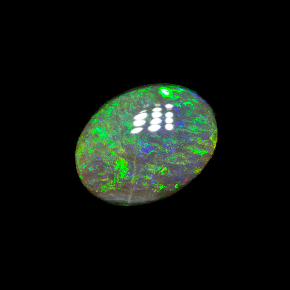 0.84 ct black opal 7.5x5.8x3.1mm