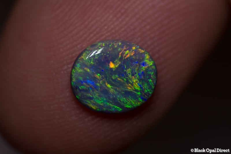 0.84 ct semi black opal 8x7x2mm