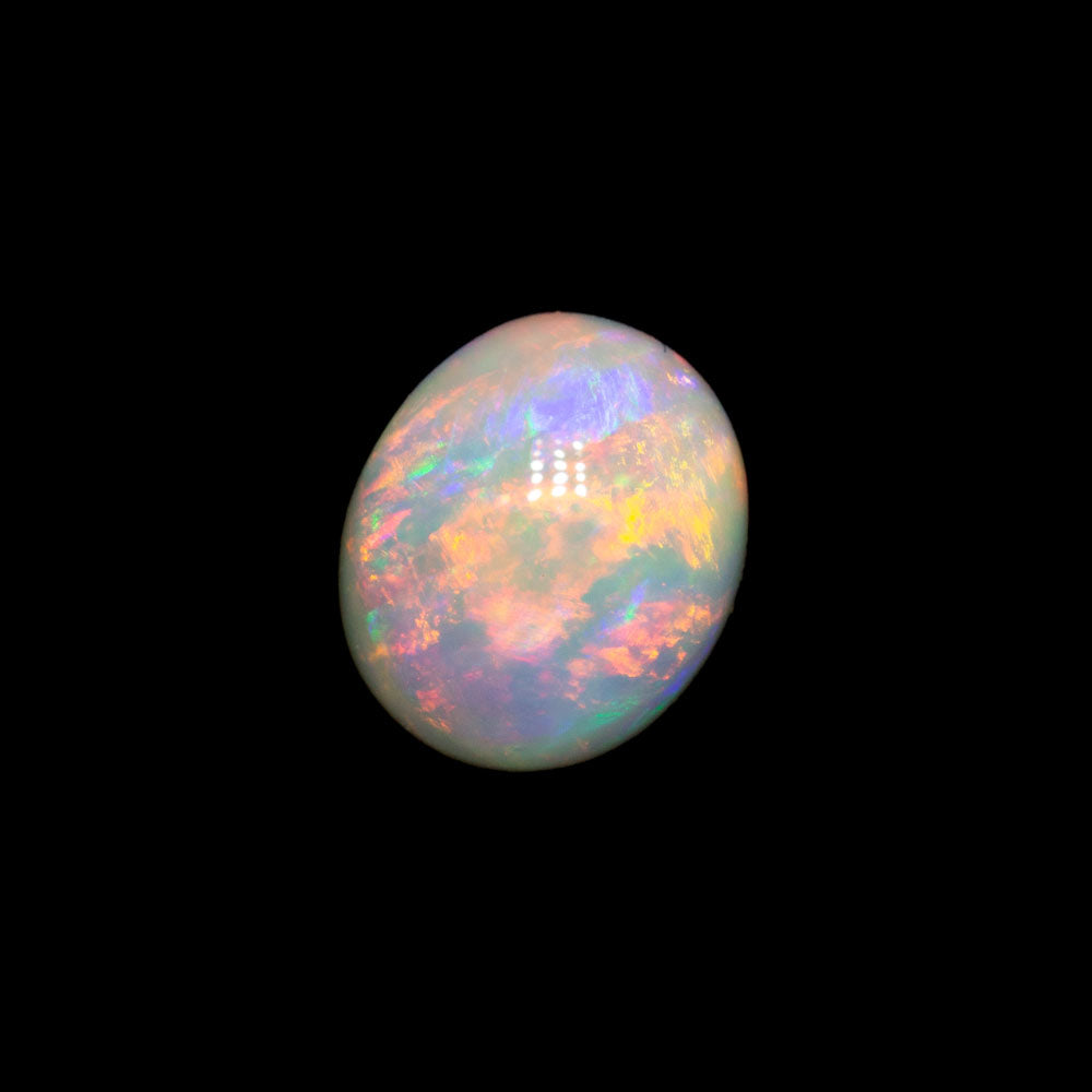 0.85 ct double-sided white opal 6.7x5.7x3.3mm