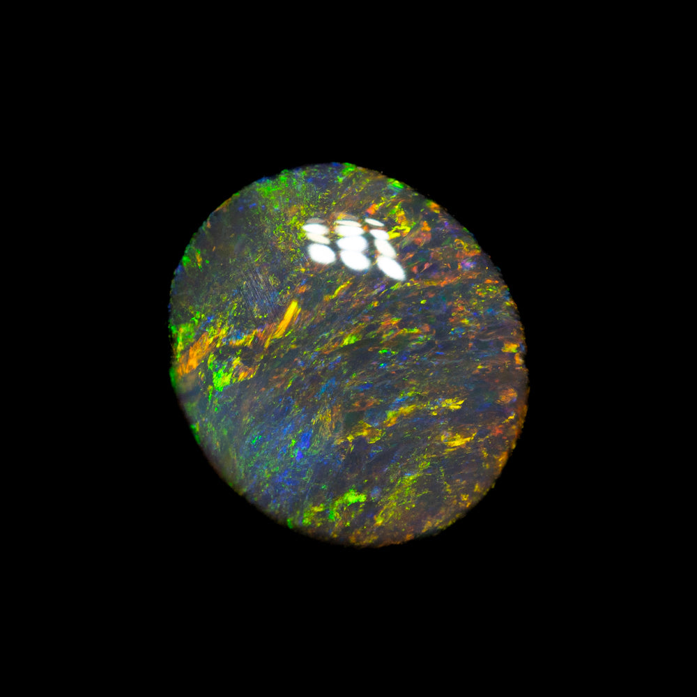 0.85 ct black opal 8x7x2.2mm