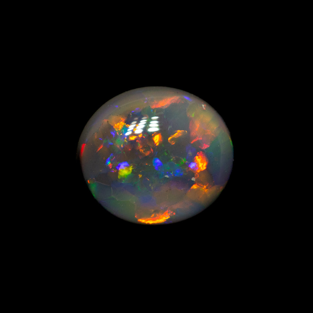 0.85 ct black opal 6.9x6.1x3mm