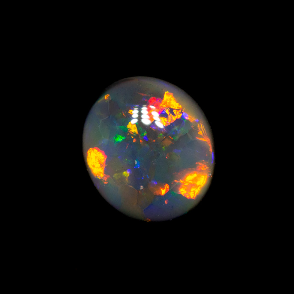 0.85 ct black opal 6.9x6.1x3mm