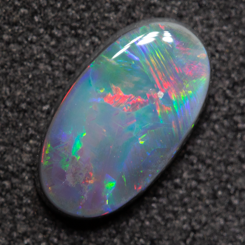0.86 ct black opal 9x5.1x2.3mm