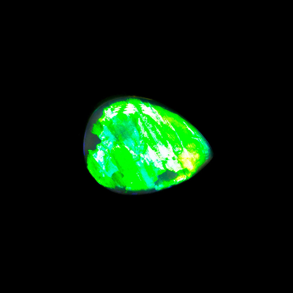 0.86 ct black opal 7.4x5.8x2.9mm