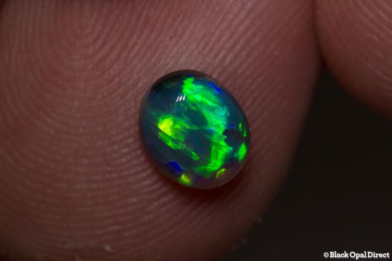 0.86 ct black opal gem 7x6x4mm