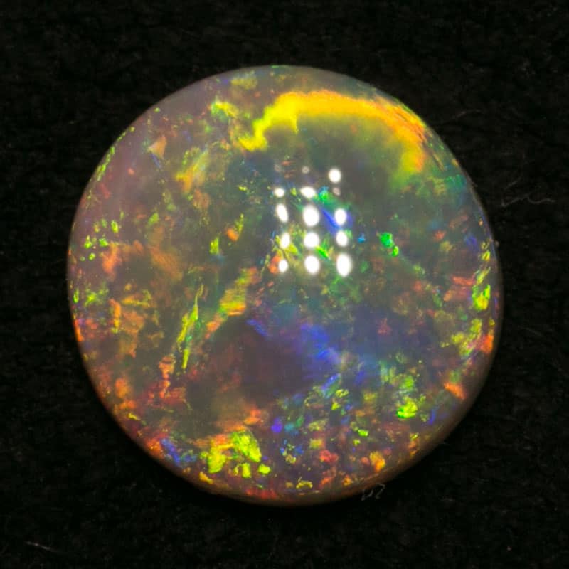 0.86 ct crystal opal 7mm round x2mm