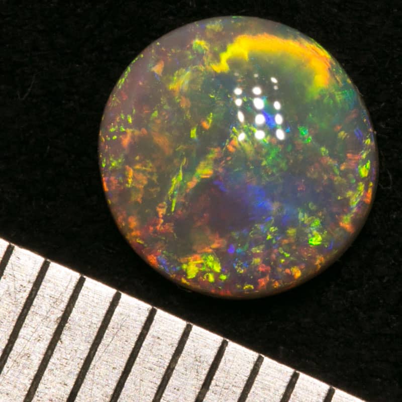 0.86 ct crystal opal 7mm round x2mm