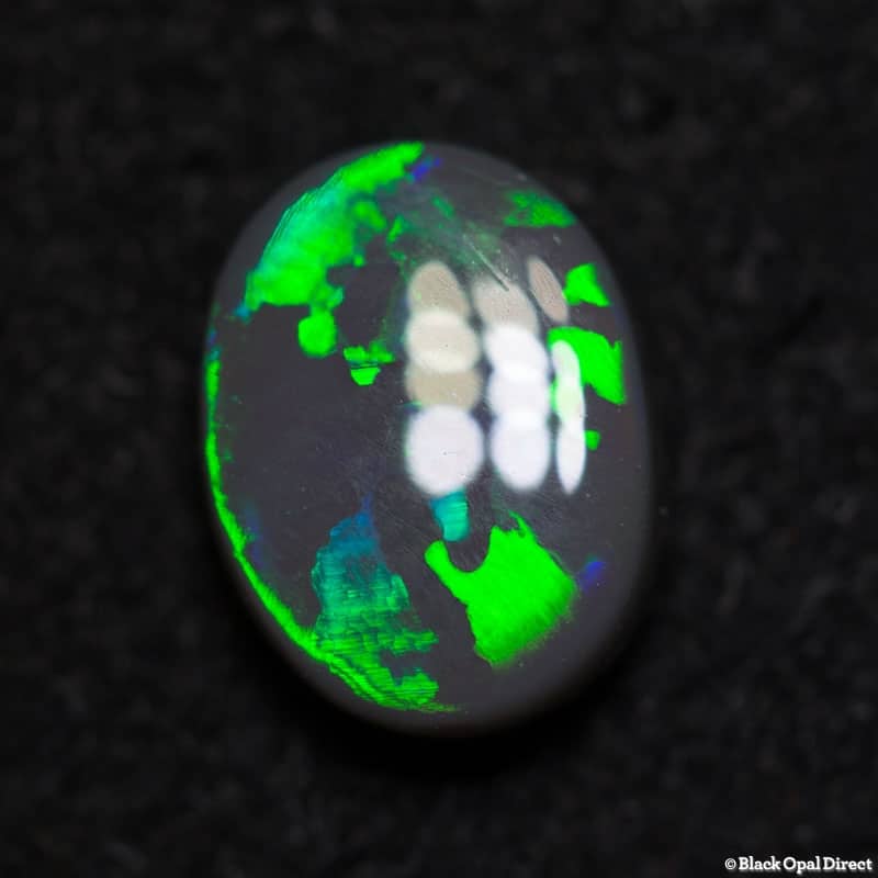0.86 ct dark opal 7.5x5.5x3mm