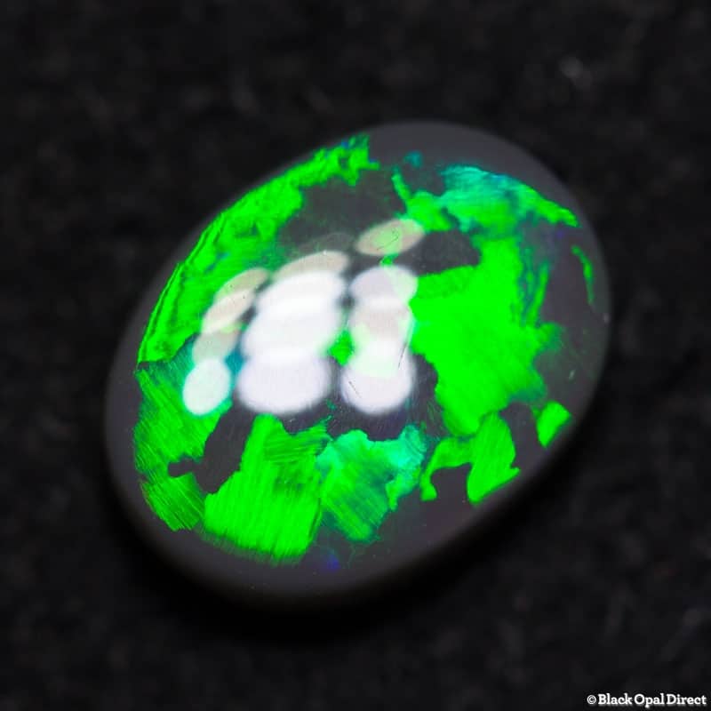 0.86 ct dark opal 7.5x5.5x3mm