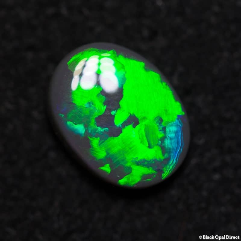 0.86 ct dark opal 7.5x5.5x3mm
