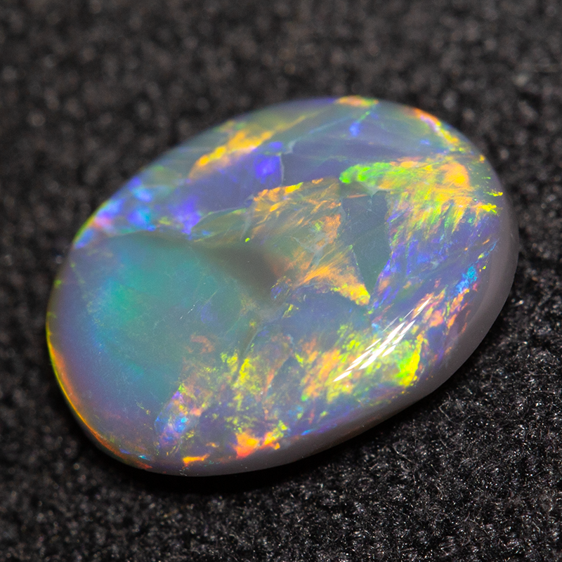 0.87 ct black opal 8.4x6.5x2.4mm