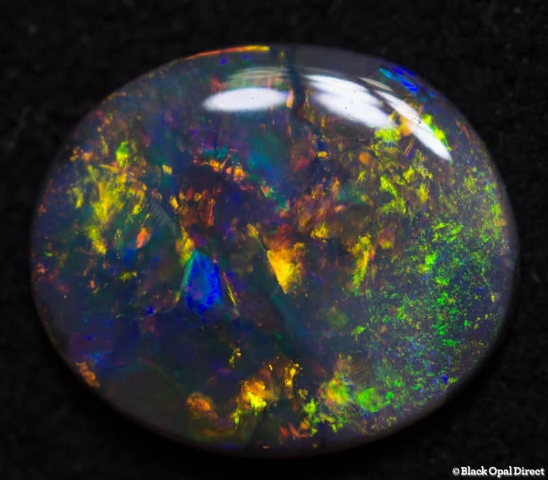 0.87 ct semi black opal 9x7.5x2mm